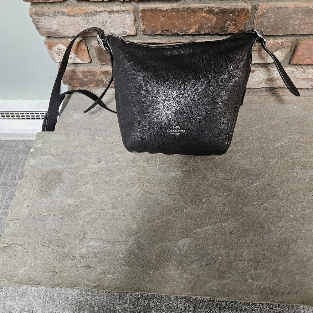 Coach black duffle bag. In good condition. Very spacious Crossbody bag.